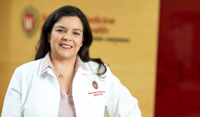 A woman in a white lab coat