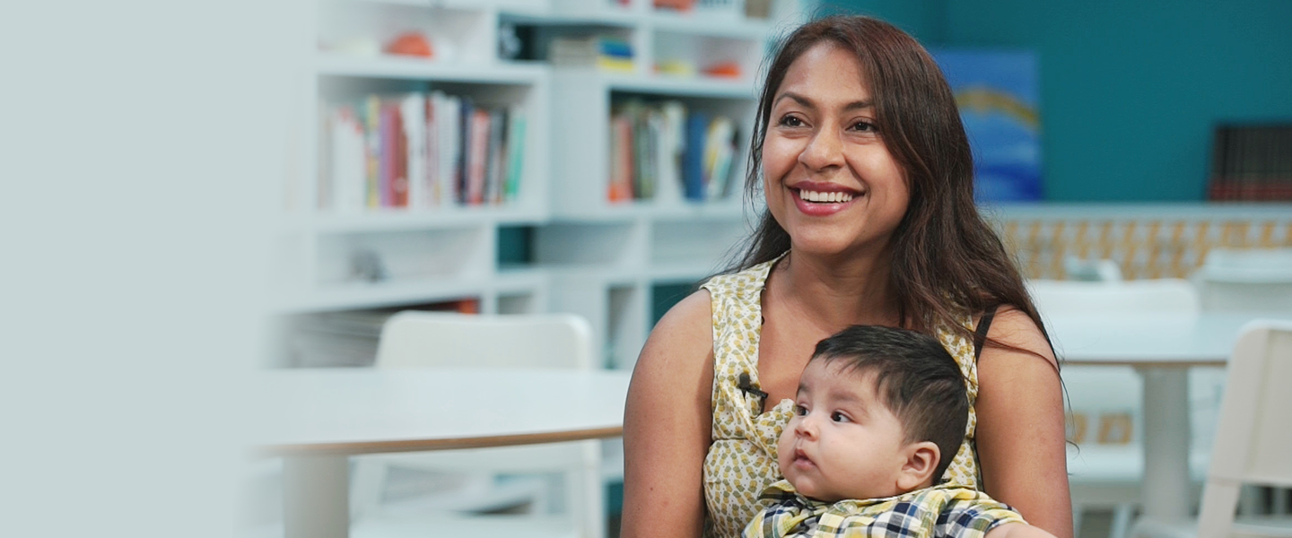 Woman holding a child