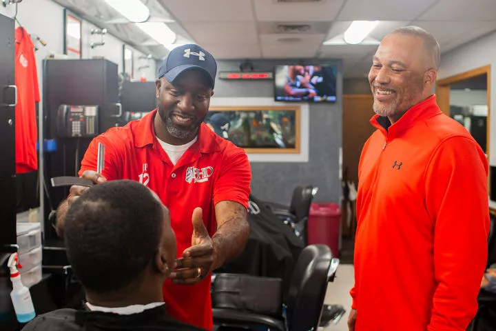 Jeff Patterson and J.C. Dawkins together in a barbershop